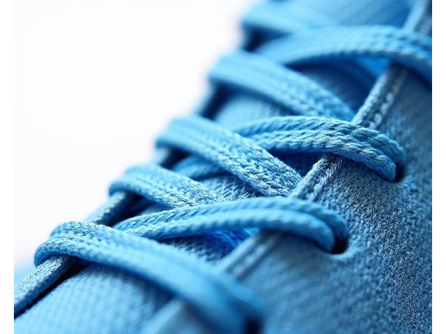 Close-up of fabric woven from recycled ocean plastic, showcasing its unique texture and modern aesthetic.